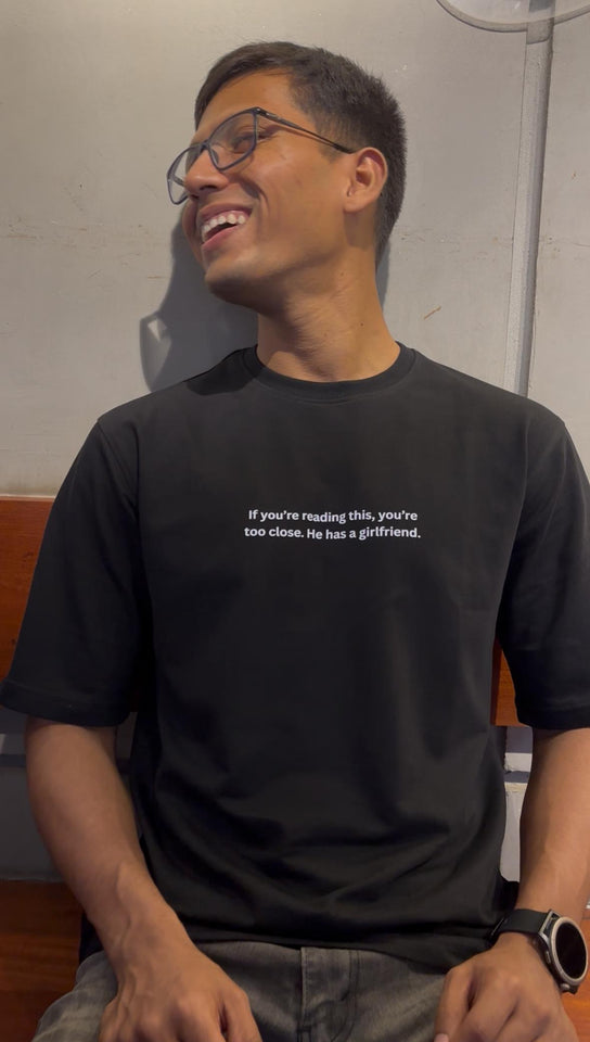 'If you're reading this' Oversized Black Tshirt